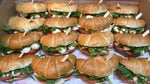 Mini croissant filled with pesto, bocconcini and tomato